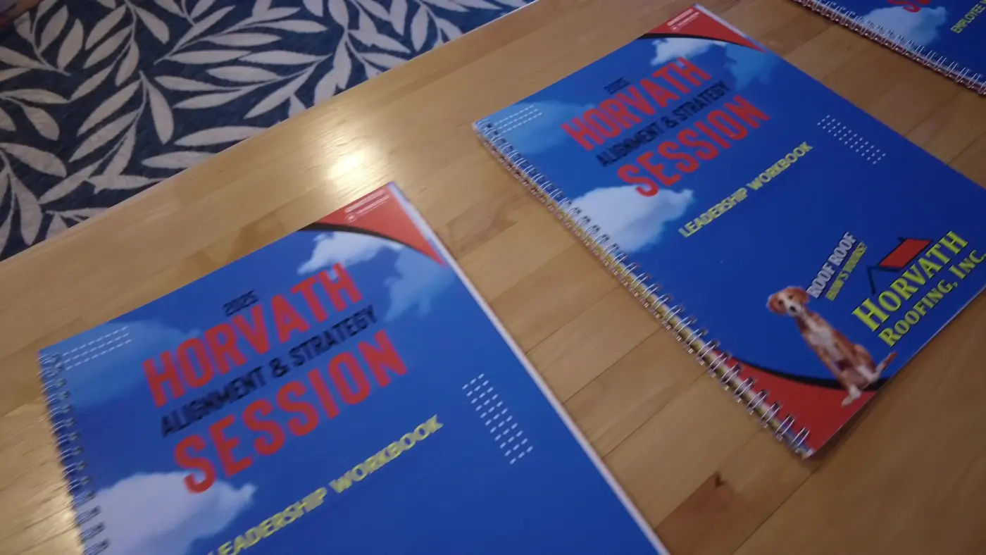 Two Horvath Alignment and Strategy Session leadership workbooks on a table