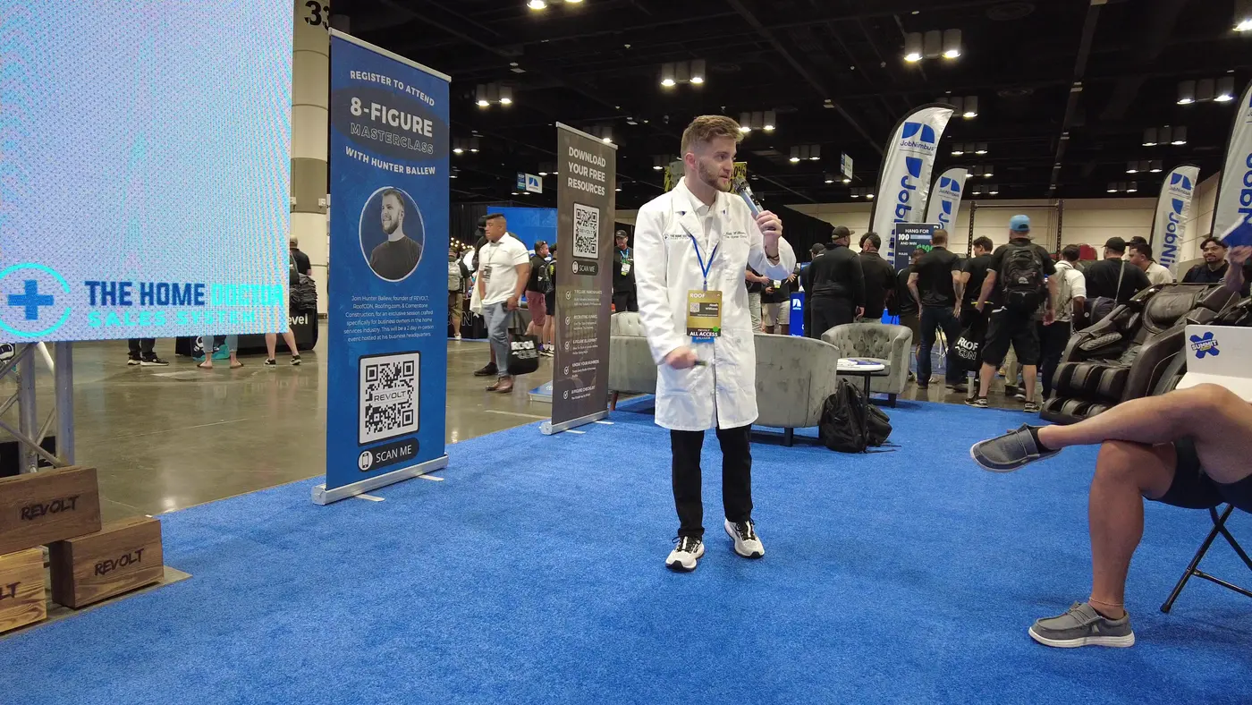 Teaching from the Home Doctor booth at RoofCON.
